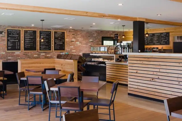 Dining room with tables and chalkboard menus