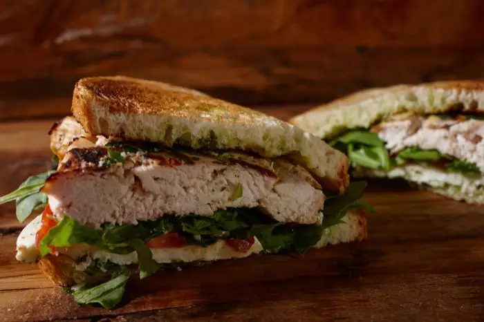 Chicken caprese sandwich on toasted sourdough
